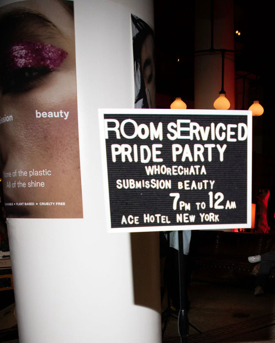 Advertisement for a 'Room Serviced Pride Party' at Ace Hotel New York with a black and white sign.