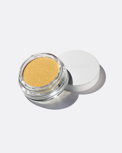 plastic-free plant-based biodegradable gold glitter in an open plastic-free container