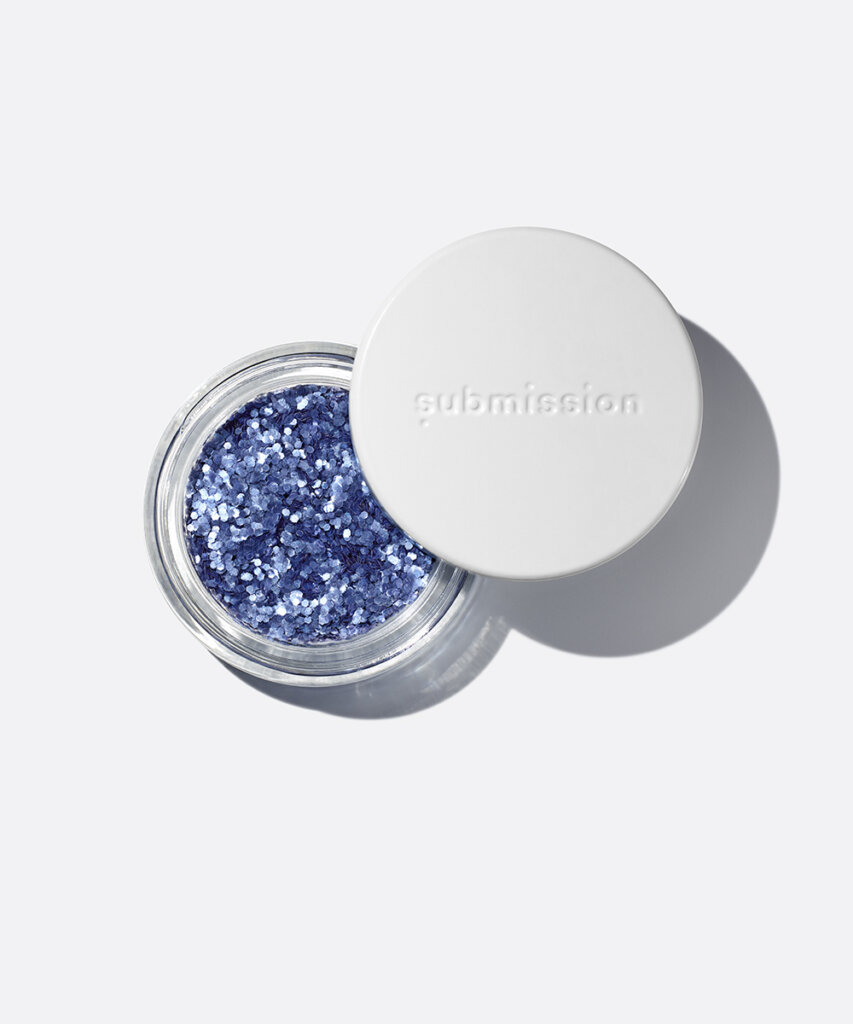 plastic-free plant-based biodegradable blue glitter in an open plastic-free container