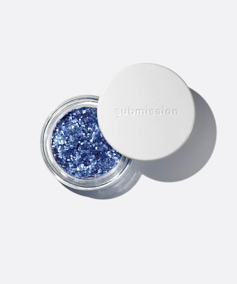 plastic-free plant-based biodegradable blue glitter in an open plastic-free container