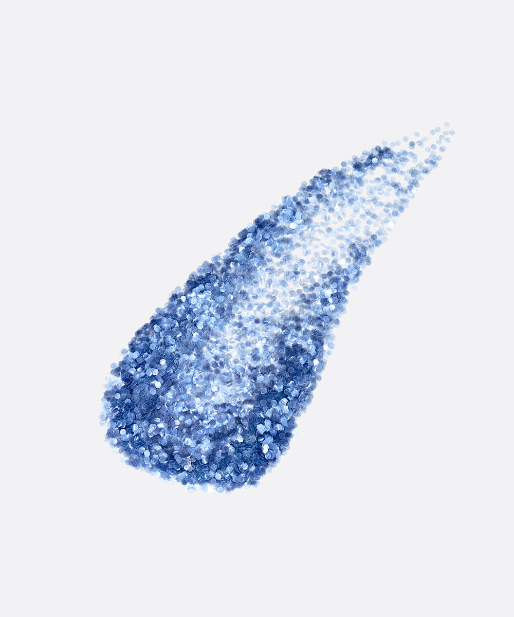 a stylized swipe of plastic-free plant-based biodegradable blue glitter highlighting the glitter’s texture and varied shades of blue