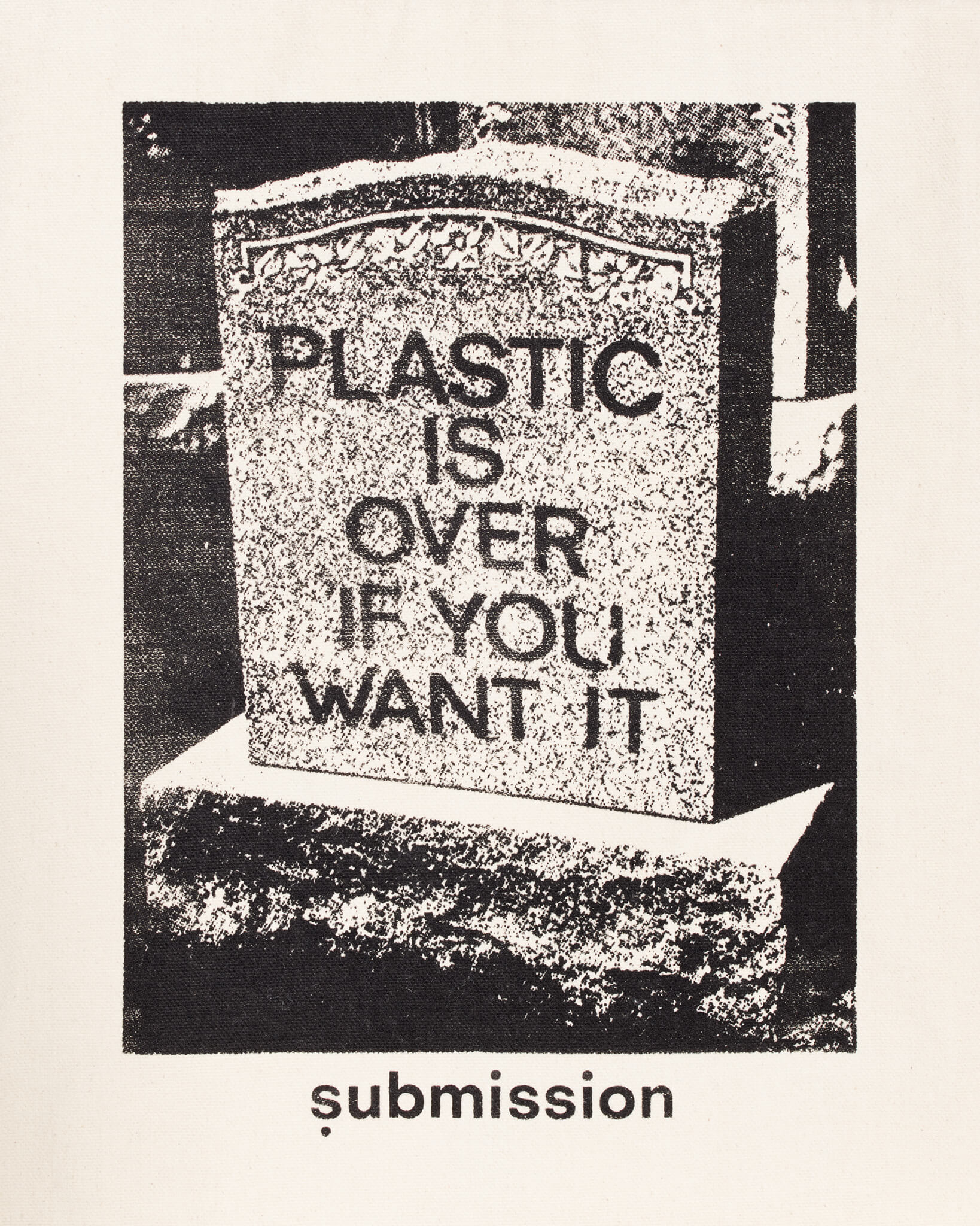 A detail shot of a large greyscale graphic on a brushed canvas tote bag made with 100% post-consumer recycled cotton, depicting a headstone with the words “PLASTIC IS OVER IF YOU WANT IT” in capital letters, and a logo beneath the graphic with the word “submission” in bold, lowercase type, all printed with plastic-free ink